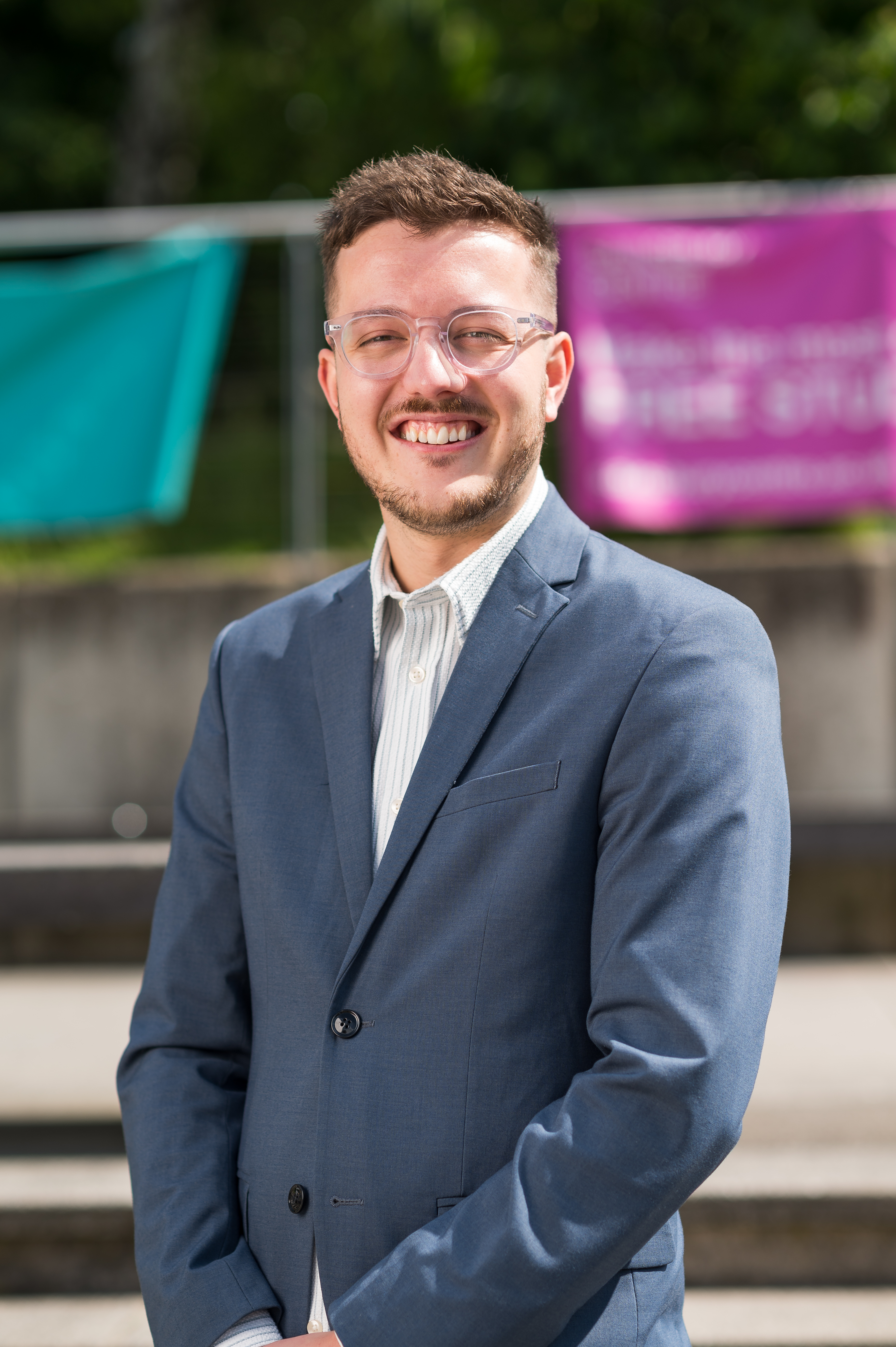 Staff member standing at UEA