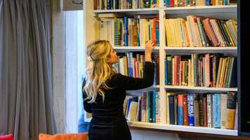 Student Browsing Books in the Multifaith Centre