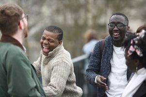 3 students laughing