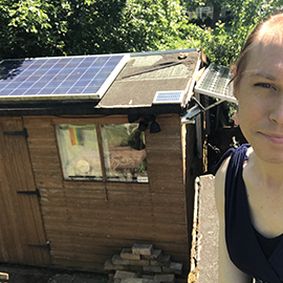 kit rackley by a solar powered shed 