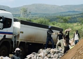 Mining Lorries on a hillside