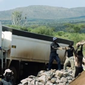Mining Lorries on a hillside