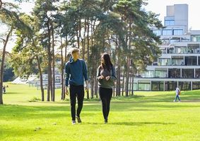 Students walking near ziggurats