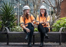 Q Flow employees laughing together