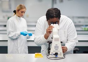  mature chemistry students in lab