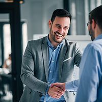 two men shaking hands 