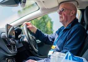 Man driving a car