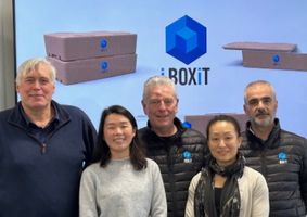 iBoxit team in front of presentation