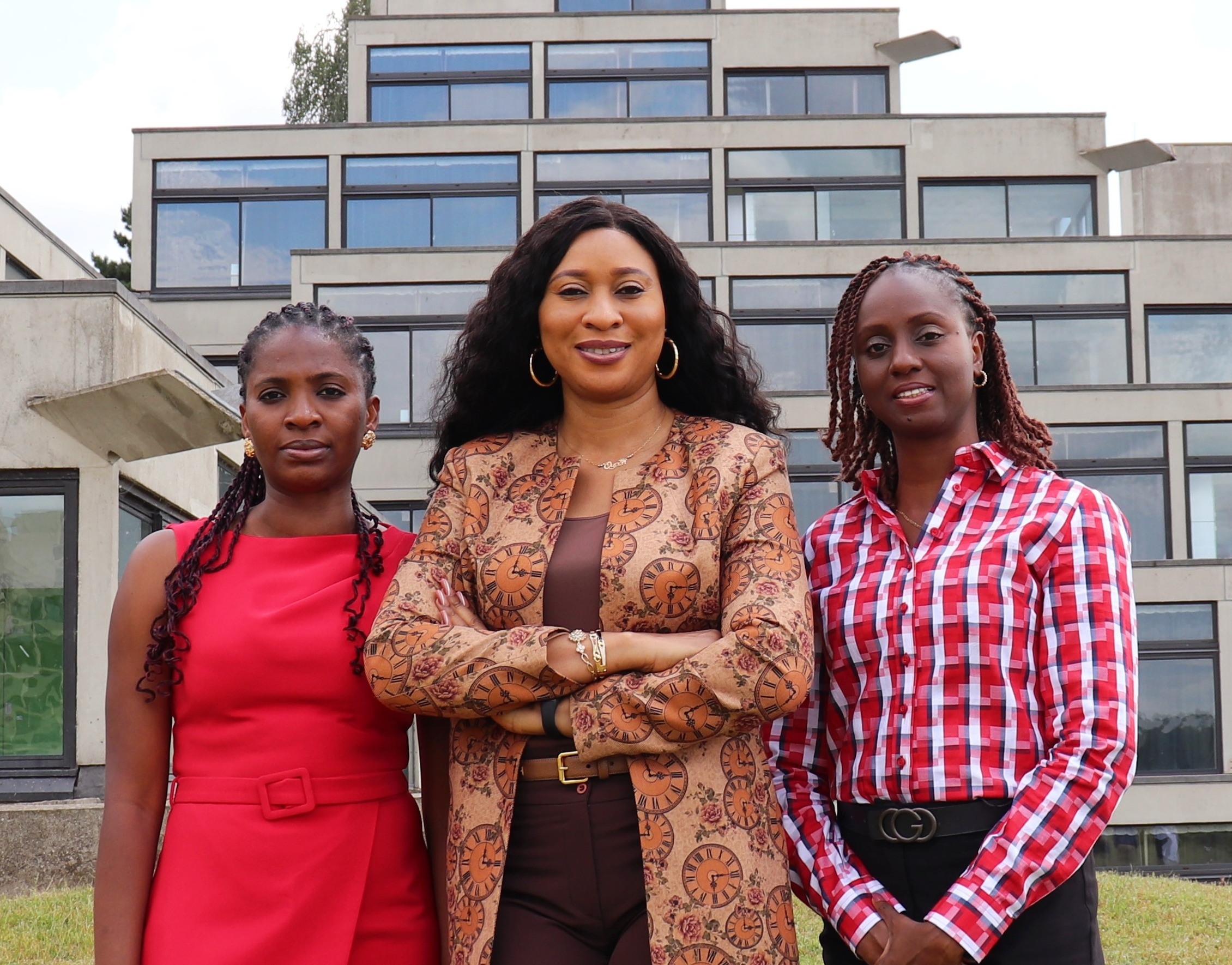 Staff members standing at UEA