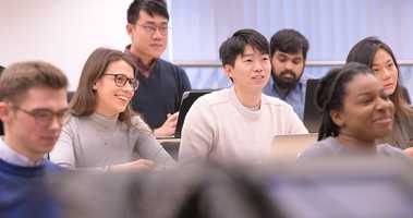 Postgraduate students in a lecture