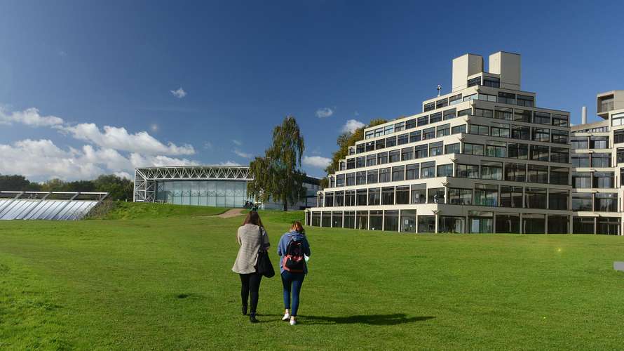 Students in front of the Ziggurats/ Sainsbury Centre