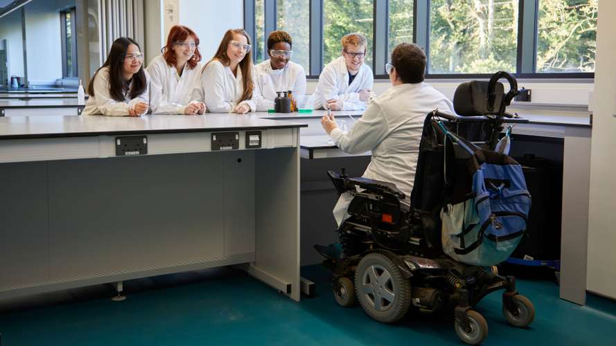 Dr Katherine Deane teaching science practical in the New Science Building