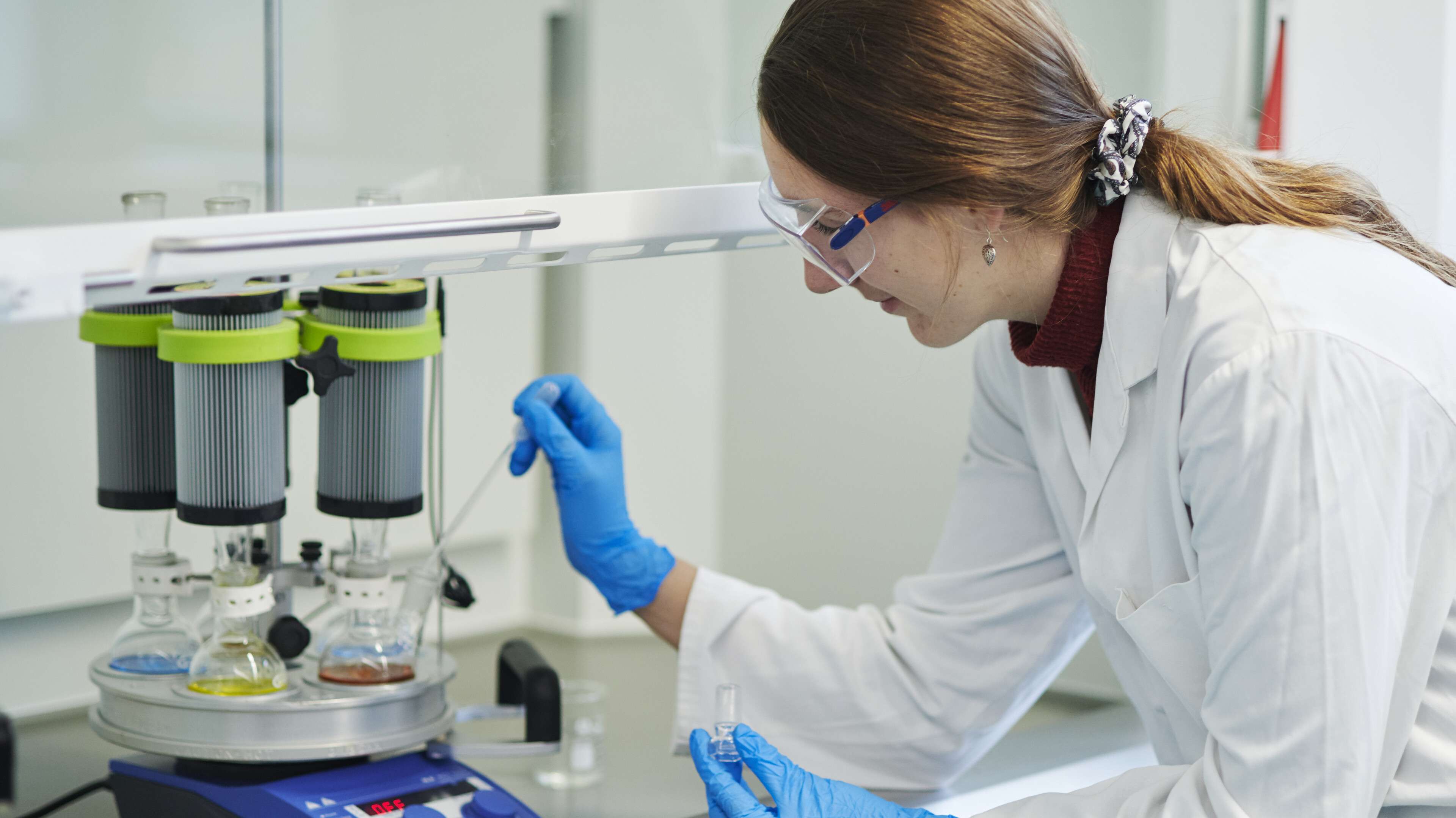 Chemistry student conducting a lab experiment