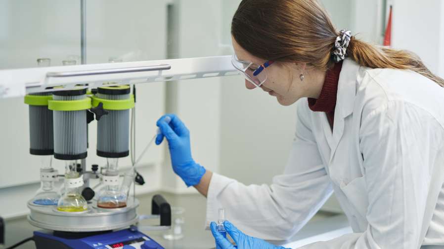 Chemistry student conducting a lab experiment