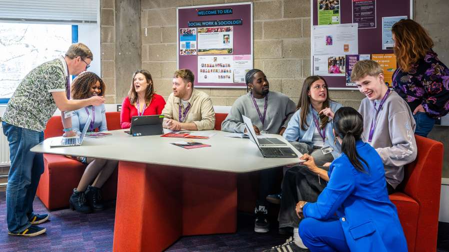 Social Work students and staff in discussion