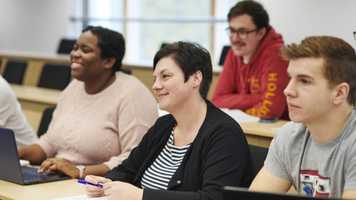 Mature students in a lecture in a Julian Centre lecture theatre.