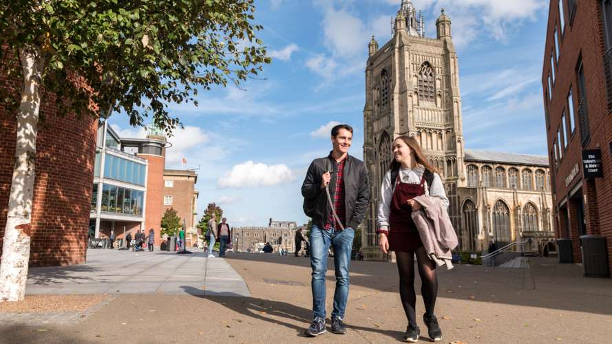 Students outside St Peter Mancroft Church in Norwich City Centre.