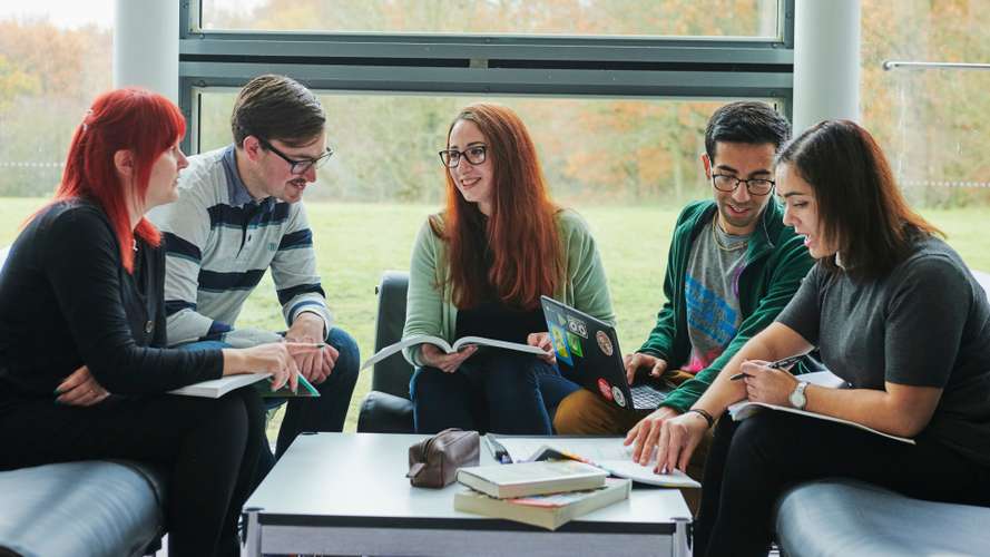 Mature students collaborating in Sainsbury Centre.