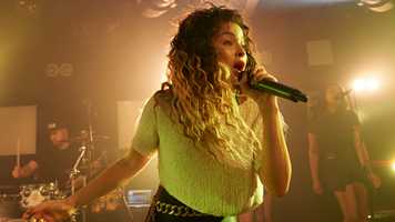 Ella Eyre singing at gig