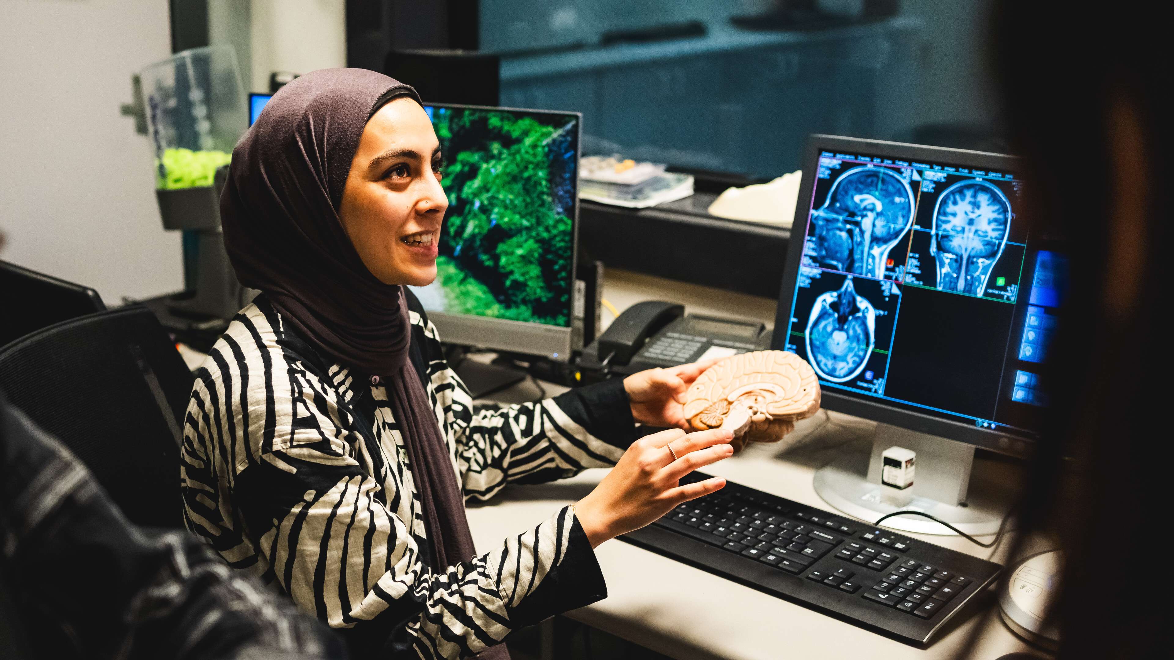 Psychology students are working in the MRI room at Brain Imaging Centre