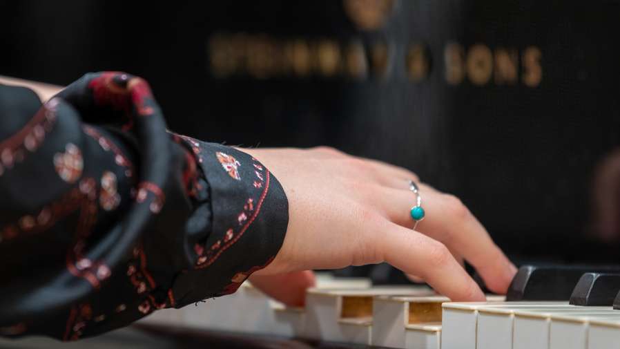 Student Playing the Piano at UEA