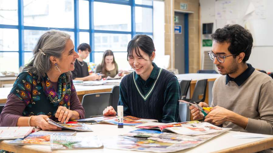 DEV students working together in a Decolonising knowledge session. The session includes body mapping and collage.