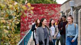 Students walking outside library