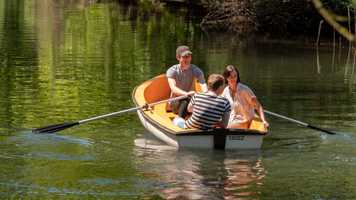 Students rowing a boat