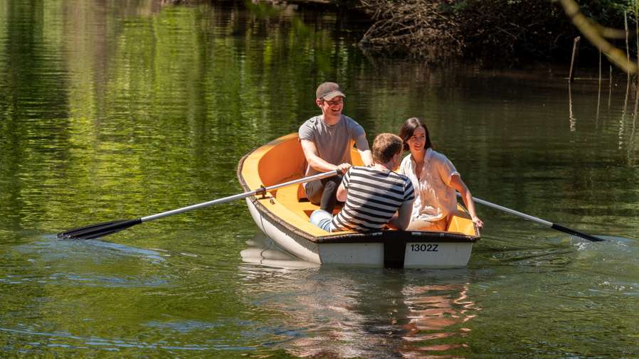 Students rowing a boat
