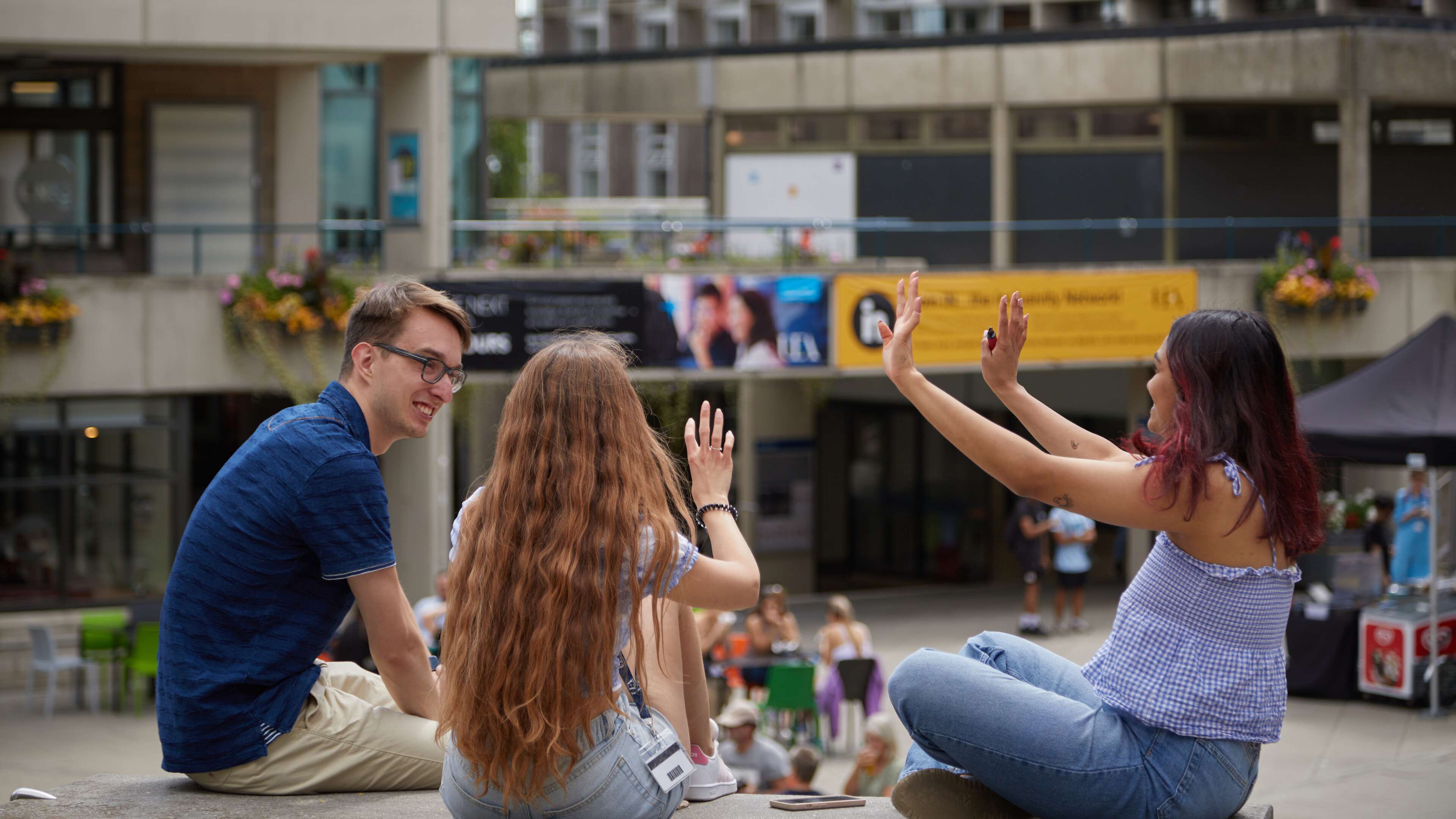 Students socialising in the square