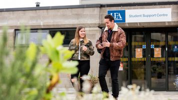 Students outside the Student Support building