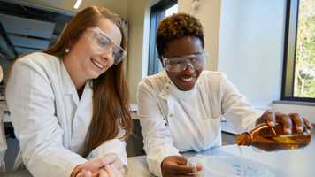 Students doing science practical in a lab in the New Science Building