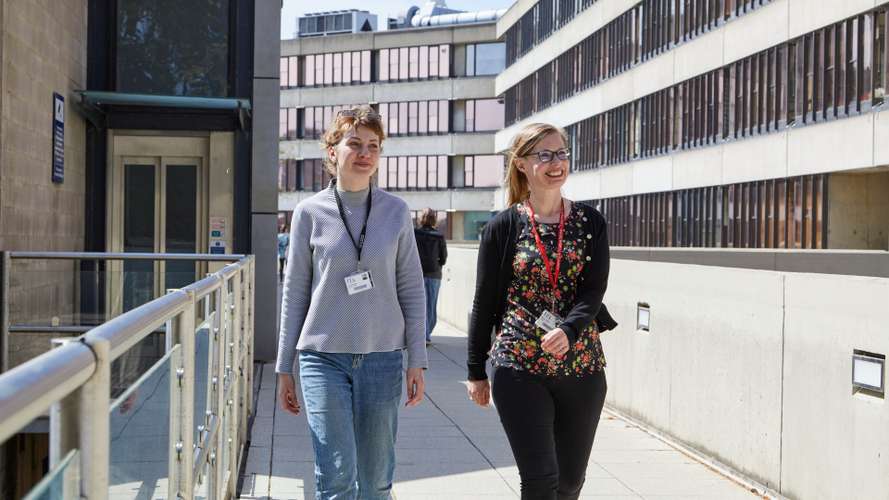 Staff members on walkway