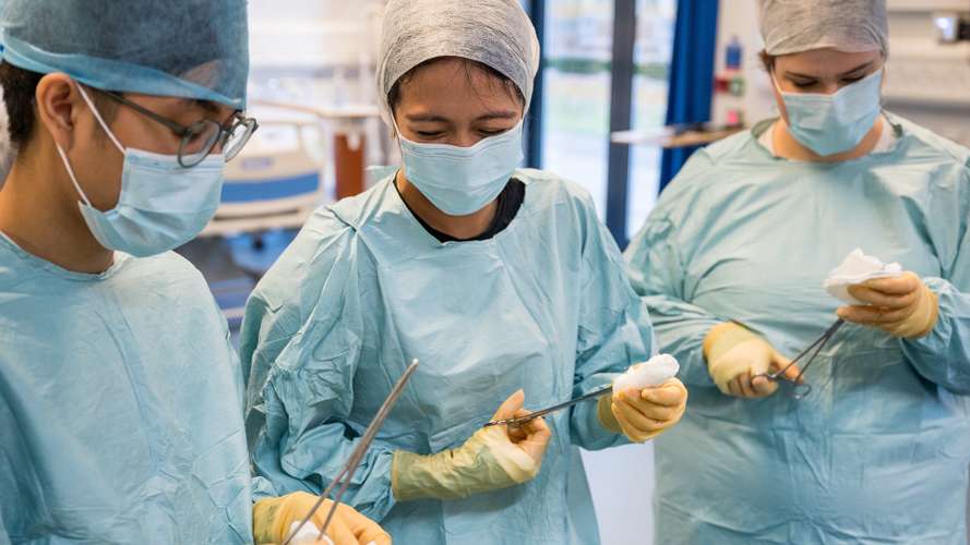 Students in medical scrubs