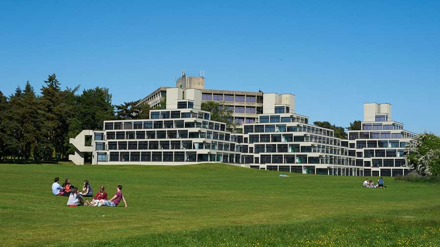 Students on Campus in front of the Ziggurats