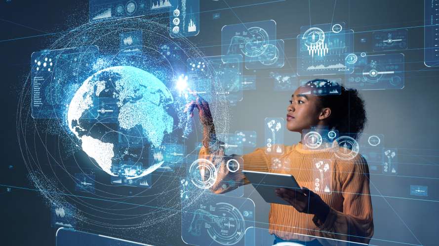 Student looking at globe