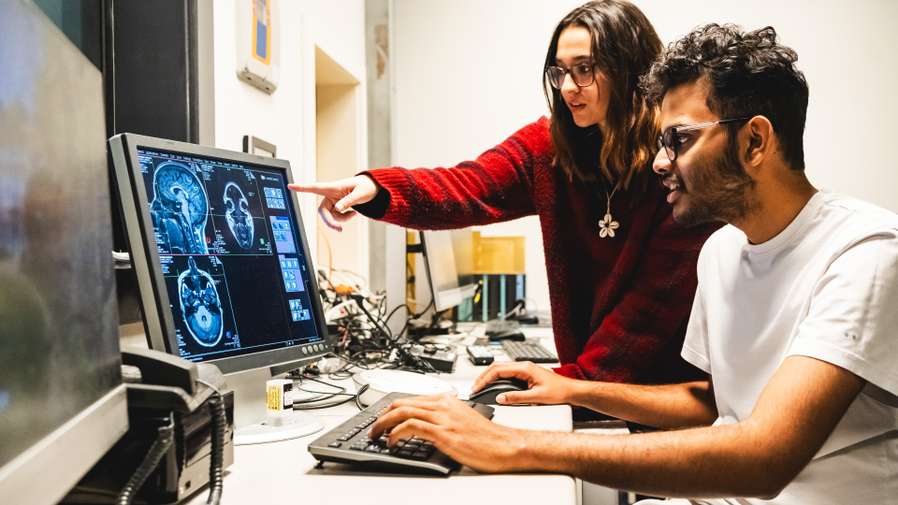 Psychology students are working in the MRI room at Brain Imaging Centre
