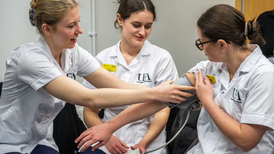 Physiotherapy students working together in a simulation session at Edith Cavell Building