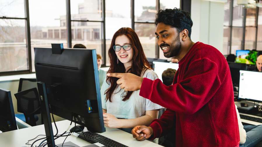 Data Science and Computing Science students working together in the Data Science and AI lab