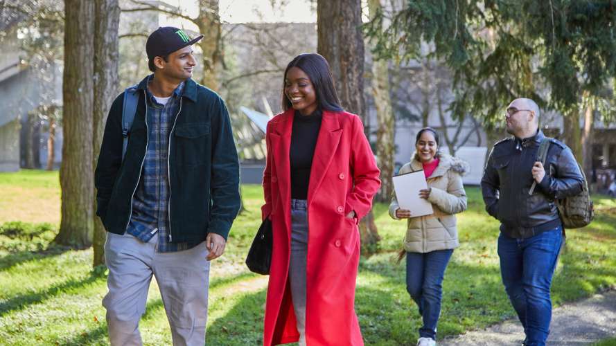 Students walking outside on campus