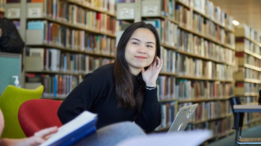 Students studying in the Library