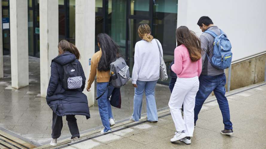 Students walking outside the New Science Building