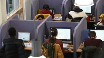 UEA students are pictured using one of the computer suites in the library on campus