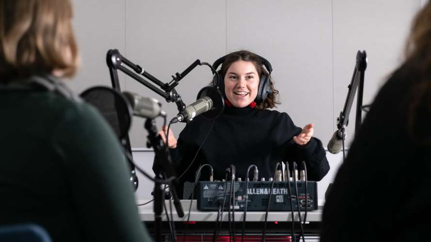 Student using broadcast equipment