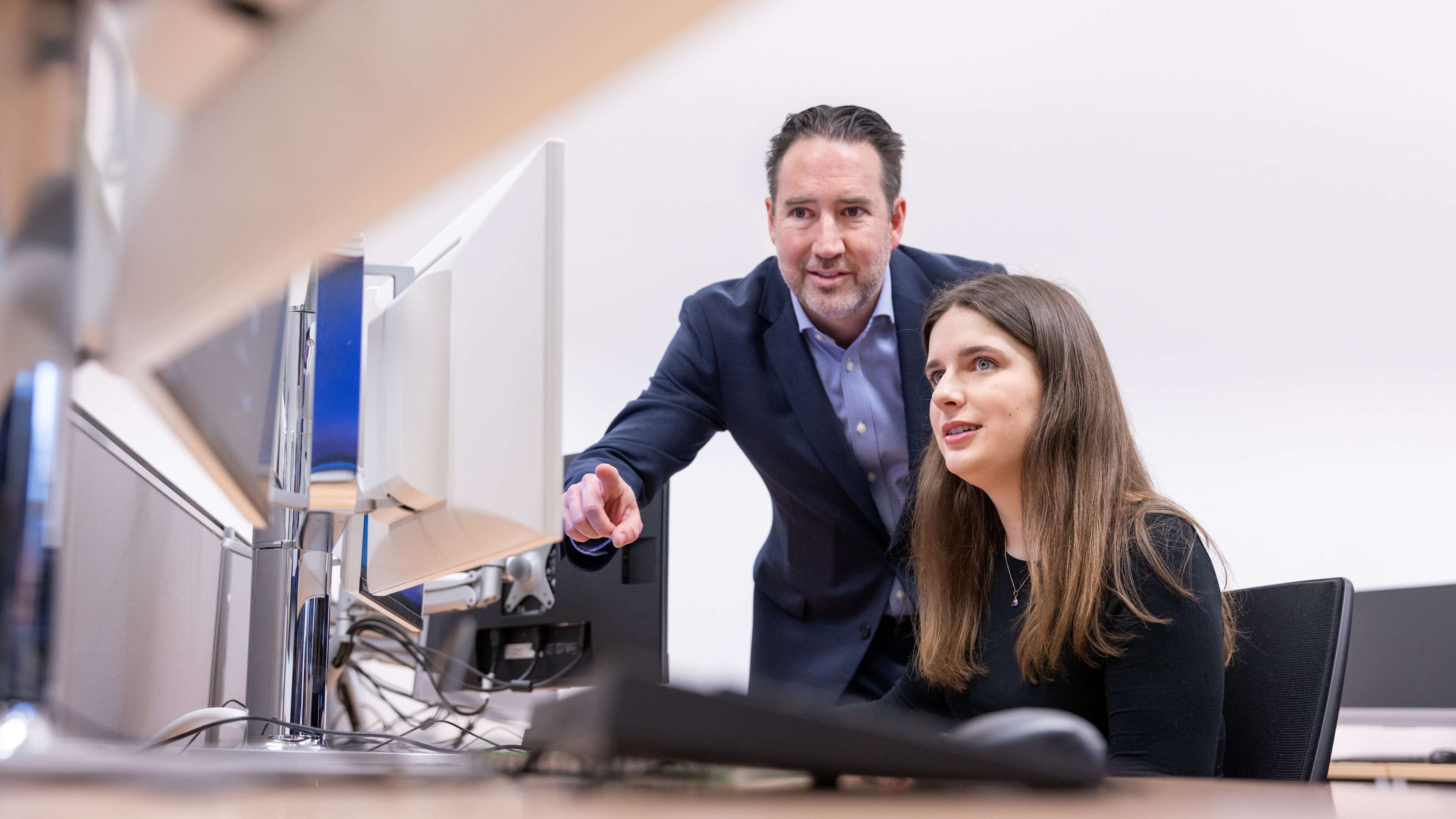 Business Students working together in Fintech Lab Session in Thomas Paine Study Centre