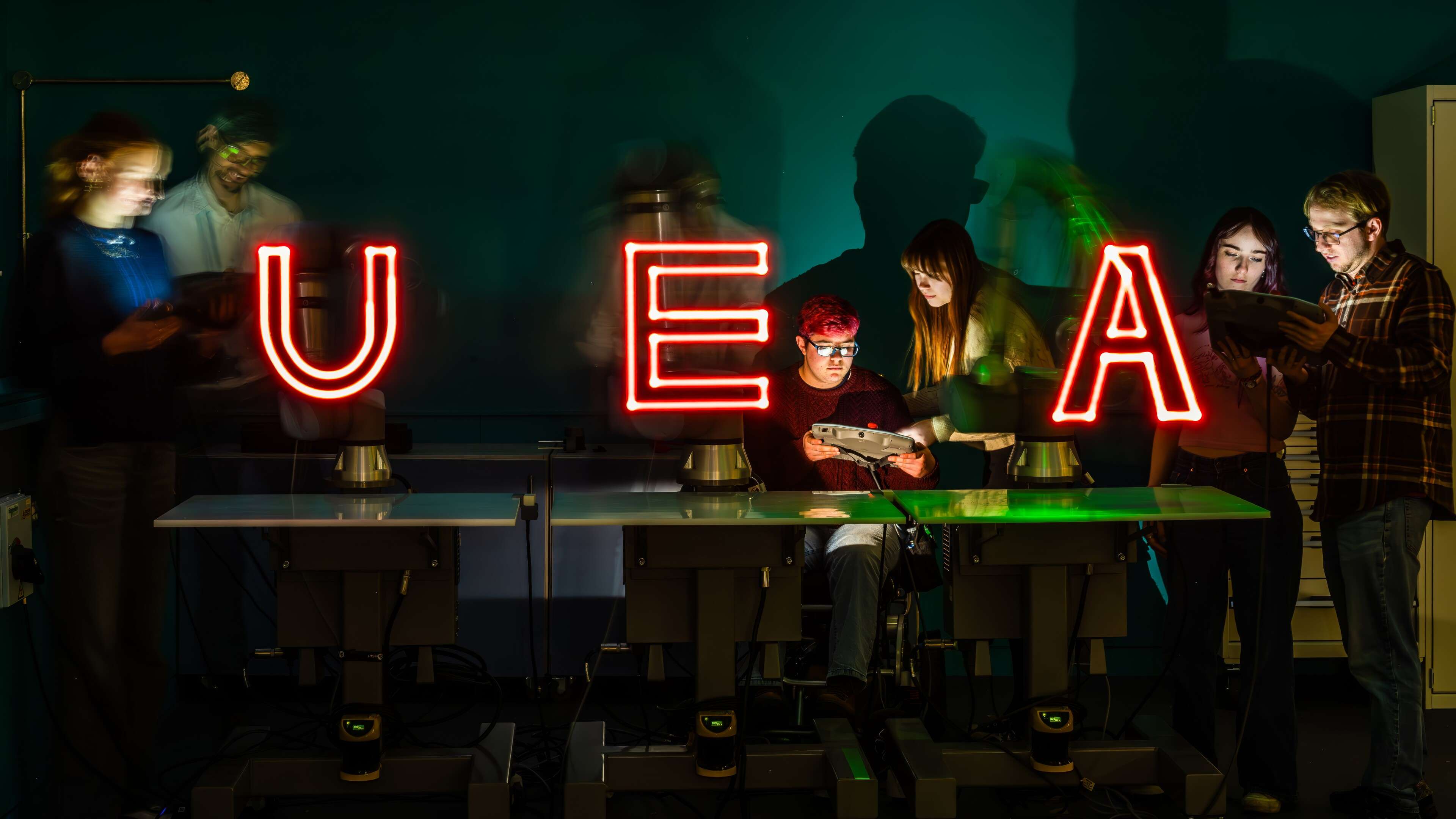 Engineering students using equipment in Productivity East