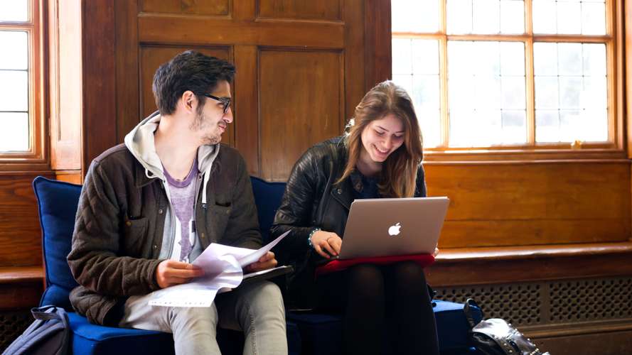 Students studying at Earlham Hall, home to the Law School at UEA.