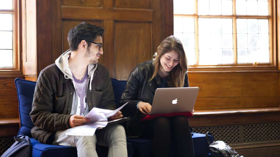 Students studying at Earlham Hall, home to the Law School at UEA