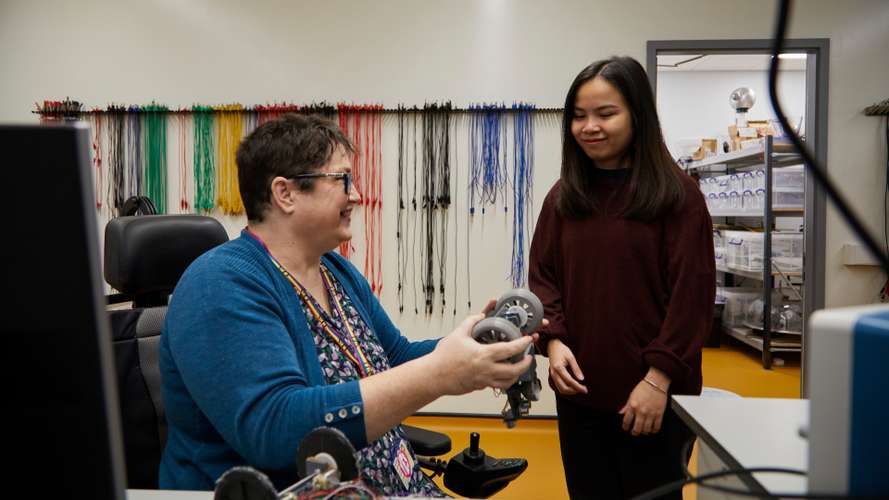 Dr Katherine Deane teaching students in an engineering lab in the New Science Building