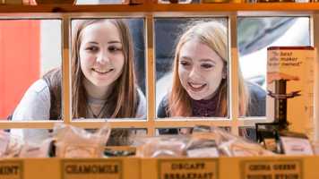 Students looking through shop window